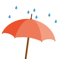 An umbrella with rain pouring on it